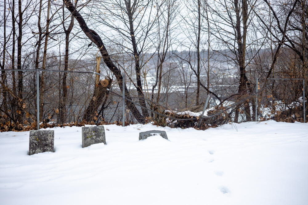 Headstones, Foot Tracks, and Fence